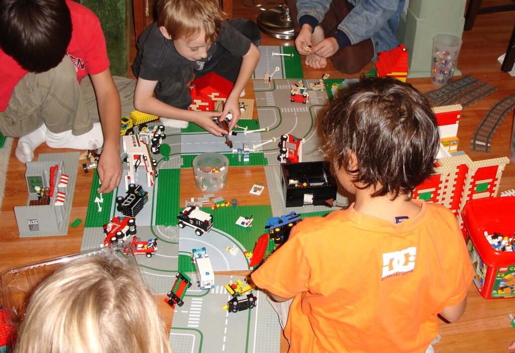 Kids playing in a LEGO city